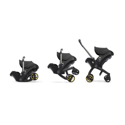 Doona Car Seat + Latch Base Travel System - Nitro Black: Rubber Tires, Aluminum Frame, Minimum Weight 4 Lbs, Weight 10 Lbs