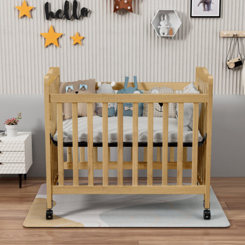 Harriet Bee Hinojosa Mini Crib With 3 Position Adjustable Mattress Board & Reviews | Wayfair