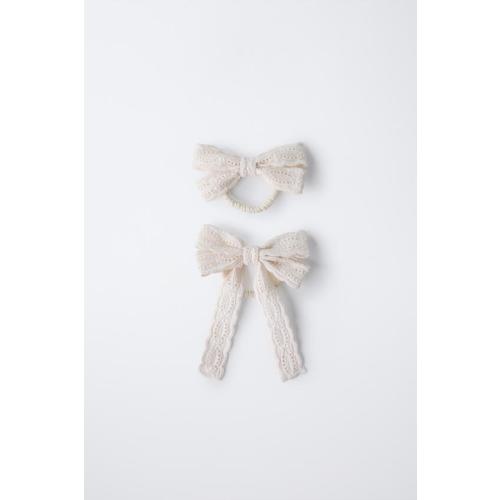 TWO-PACK OF HAIR SCRUNCHIES WITH CUT-OUT BOWS