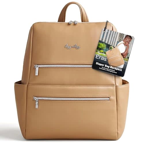 Itzy Ritzy Eras Diaper Bag Backpack – Large Capacity Backpack Diaper Bag Featuring Sleek Design, 15 Pockets, Changing Pad, Stroller Straps, and Luggage Sleeve (Chai)