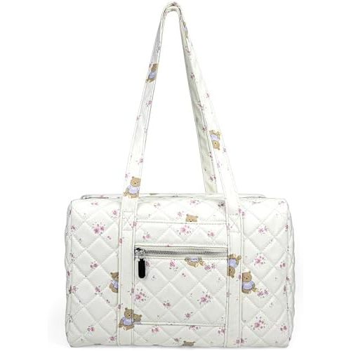 White teddy bear and floral diaper bag