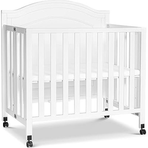 DaVinci Charlie Folding Portable 3-in-1 Convertible Mini Crib and Twin Bed in White, Removable Wheels, Greenguard Gold Certified