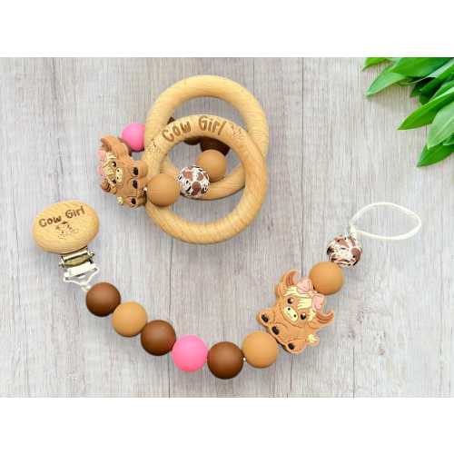 Personalized silicone Pacifier Clip and baby rattle with highland cow design for baby girl with bow in pink