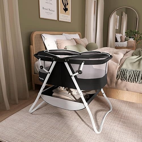 Dream On Me Karley Bassinet in Black, Lightweight Portable Baby Bassinet, Quick Fold and Easy to Carry , Adjustable Double Canopy, Indoor and Outdoor Bassinet with Large Storage Basket.