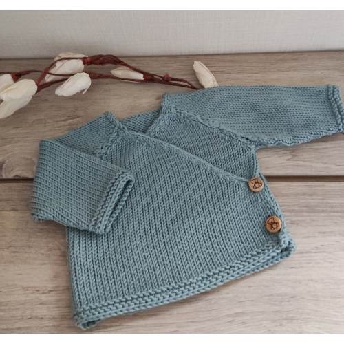 Baby wrap-over bra, hand-knitted layette in celadon merino wool and wooden buttons