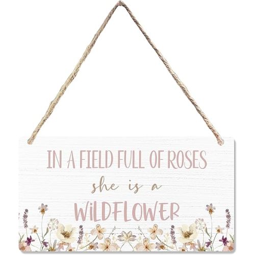 CGBHW In a Field of Roses She is a Wildflower Wooden Sign, Pink Floral Baby Girl Nursery Girls Room Hanging Sign Wall Decor, Girls Bedroom Toddler Baby Kids Little Girl Room Door Decor 12 x 6 Inch