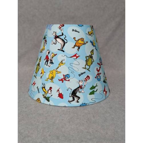 Dr. Seuss shade. Light blue. Characters are random. Cat in the hat, Horton, who, thorax, thing. Shades are 9.5" x 5" x 7" tall