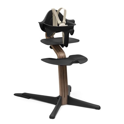 Stokke Nomi High Chair, Black/Walnut - Inspires Active Sitting - Tool-Free, Seamless Adjustability - Includes Baby Set with Removable Harness for Children 6-24 Months