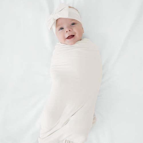 White Sand Ribbed Swaddle & Luxe Bow Headband Set