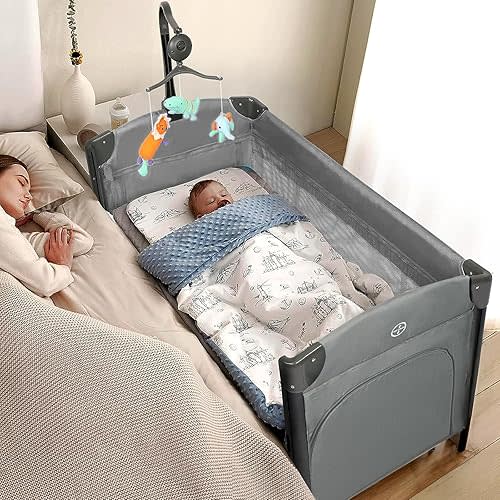 JOYMOR Baby Bedside Bassinet, Baby Bassinet, Pack n Play Convert Playpen, Quick Foldable Travel Bed with Toy, Wheels & Brake, Carry Bag for Boys Girls