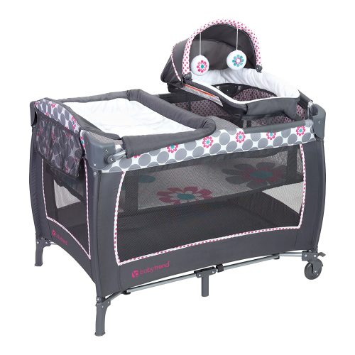 Baby Trend Lil Snooze Deluxe II Nursery Center Playard, Bassinet, Playpen & Crib with Travel Bag - Daisy Dots Pink