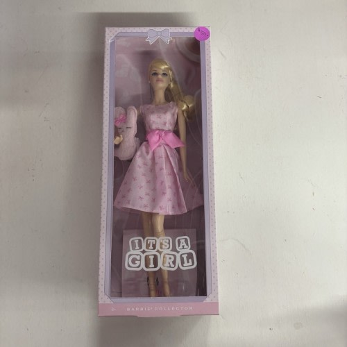 2015 It's a Girl Barbie Doll Mattel carrying a stuffed bunny rabbit NIB