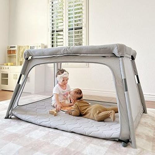 Newton Baby Travel Crib and Play Yard - New for 2024 with Easy Disassembly | Safe, Breathe-Thru Mattress | Completely Washable | Largest-in-Class with Travel Bag