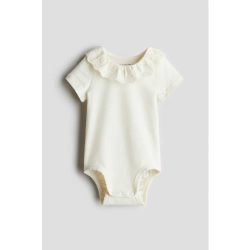 COTTON BODYSUIT WITH EYELET-EMBROIDERED COLLAR