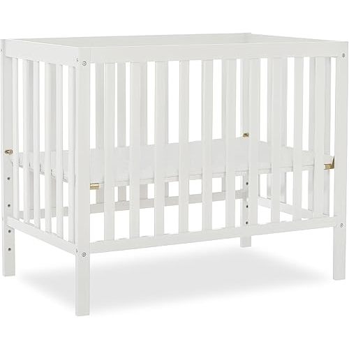 Edgewood 4-In-1 Convertible Mini Crib In White, JPMA Certified, Non-Toxic Finish, New Zealand Pinewood, With 3 Mattress Height Settings, Included 1" Mattress Pad