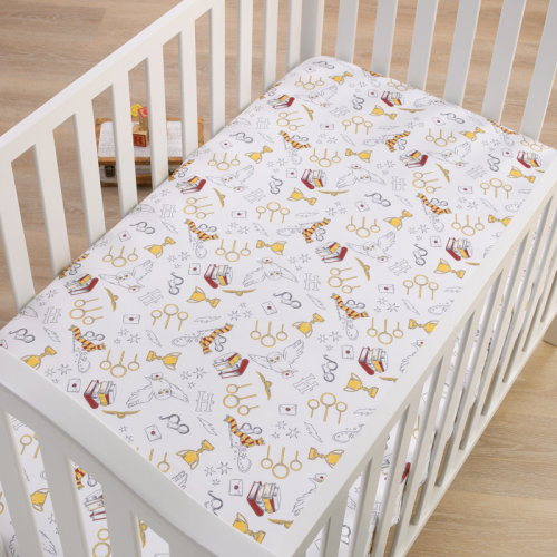 Warner Brothers NoJo Warner Bros Harry Potter White Hogwarts Icons Nursery Fitted Crib Sheet | Wayfair