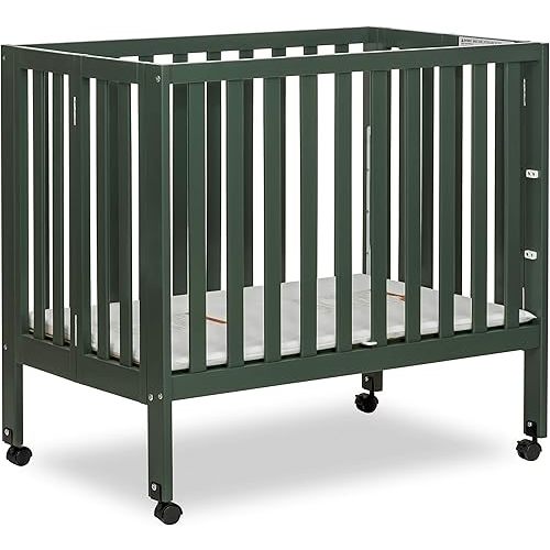 Dream On Me Jett Mini Folding Baby Crib in Olive, GreenGuard Gold & BSA, Lightweight & Portable, Patented Flat Folding System for Small Spaces & Travel, 1.5” Mattress Pad, 3 Heights, Safe Wheels