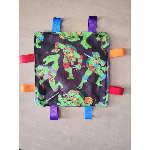 Ninja Turtles inspired Theme Baby Crinkle Toy. Size 6 x 6.. Handmade. Ribbon tags. Minky back.