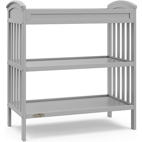 Graco Benton Changing Table with Bonus Water-Resistant Changing Pad (Pebble Gray) - GREENGUARD Gold Certified, Includes Diaper Change Pad with Safety Strap, 2 Open Storage Shelves for Organizing