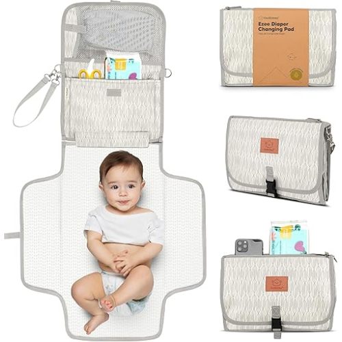 KeaBabies Portable Diaper Changing Pad - Large Waterproof Baby Changing Mat, Compact Travel Diaper Clutch, Functional Pockets Fit Newborn Essentials, Wipeable & Padded Baby Changer (Prism)