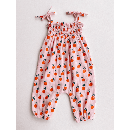 smocked jumpsuit - blush oranges