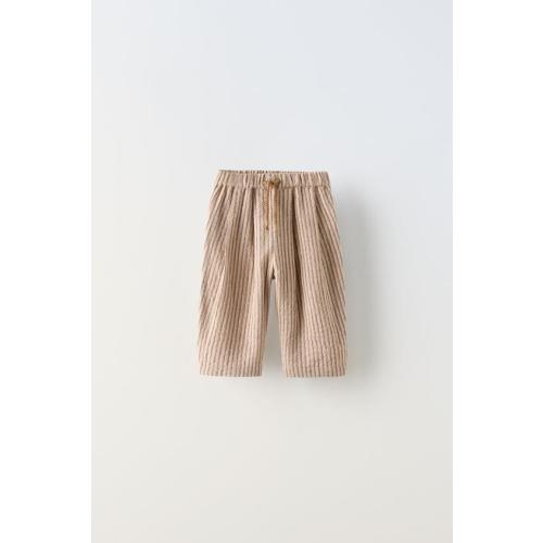STRIPED TRIANGULAR BANDANASTRIPED DRAWSTRING PANTSBUTTONED CROCHET ROMPER