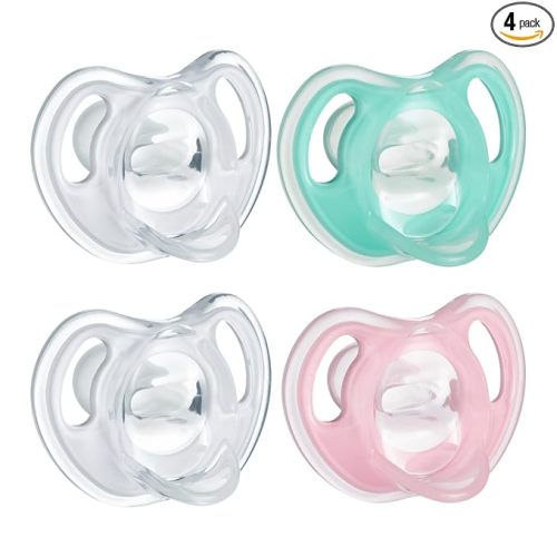 Tommee Tippee Ultra-Light Silicone Pacifier, 0-6 Months, Symmetrical One-Piece Design, BPA-Free Silicone Binkies, Clear/Green/Pink, Pack of 4