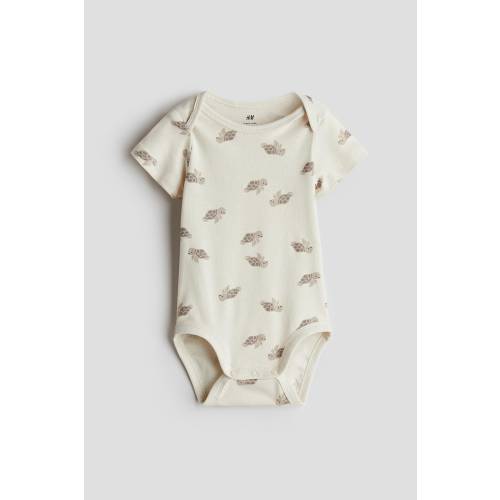 PRINTED BODYSUIT WITH LAP SHOULDERS