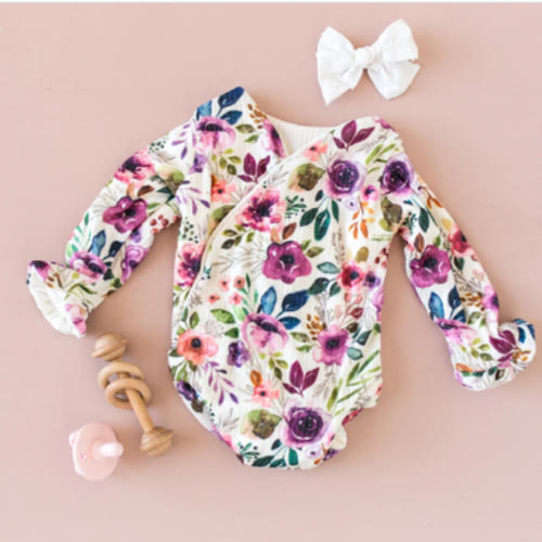 RUFFLE CUFF LONG SLEEVE WINGED BODYSUIT