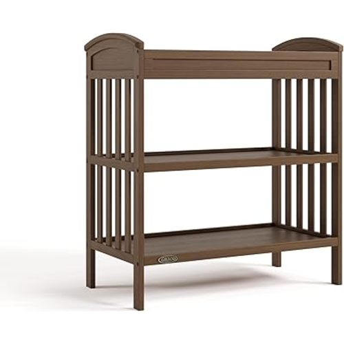 Graco Benton Changing Table with Bonus Water-Resistant Changing Pad (Hazelnut) - GREENGUARD Gold Certified, Includes Diaper Change Pad with Safety Strap, 2 Open Storage Shelves for Organizing