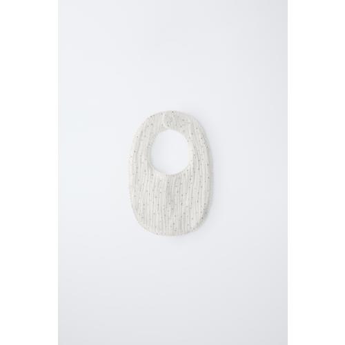 TEXTURED WEAVE BIB WITH STARS