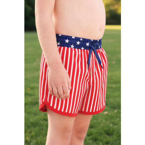 Boy's Swim Trunks in Stars & Stripes Party | Caden Lane