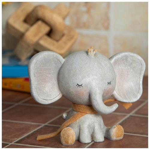 Sitting Elephant Wearing Scarf