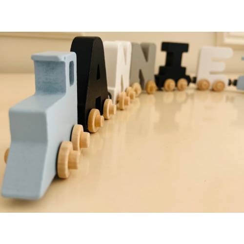 Build your own Train in our Smokey cloud letters. Personalized Wooden Magnetic Alphabet Letters. Baby blue Engine and Wagon Included.