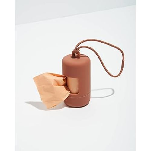 Wild One Dog Poop Bag Holder and Dispenser with Leash Attachment, Leak Proof, Easy Twist Top for Refills, includes 1 Roll Poop Bags, Cocoa