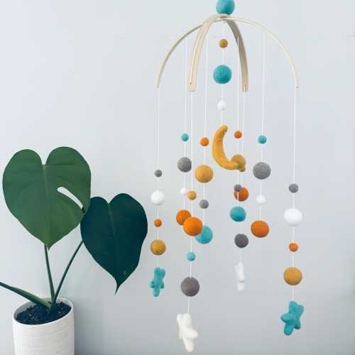 Felt baby mobile | Felt moon + stars | gender neutral nursery decor | crib mobile | baby shower | turquoise, orange, cream, mustard & fawn