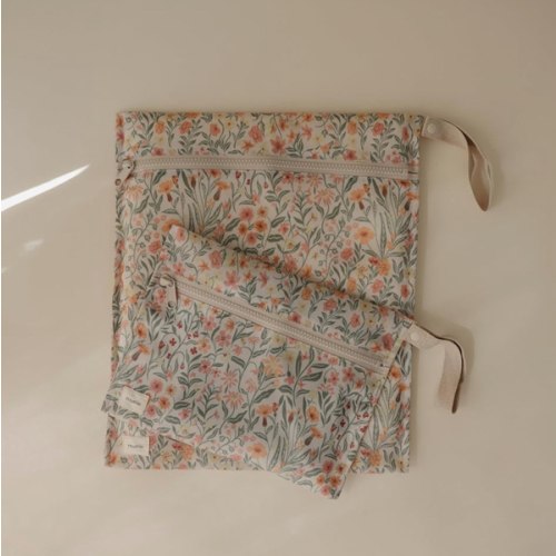 mushie Water Resistant Wet Bags | Large & Small Reusable Storage Bag for Baby Items and Travel | Zippered Pockets with Handle | Machine Washable, Set of 2 (Pastel Blooms)