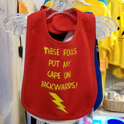 Infant bib: These fools put my cape on backwards, 100% cotton w/ Velcro closure. Baby humor | superhero | caped crusader | lightning bolt