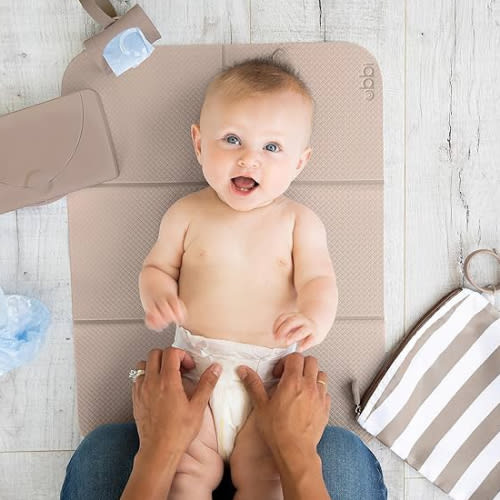 Ubbi On-The-Go Diaper Changing Baby Mat, Soft and Comfortable Diaper Bag Accessory Must Have for Newborns, Easy to Clean, Portable Folding Pad, Baby Traveling Accessories, Taupe