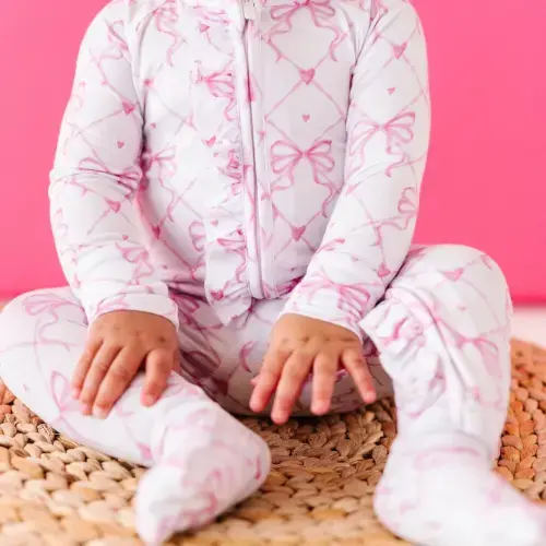 Take A Bow Ruffle Footie- Newborn