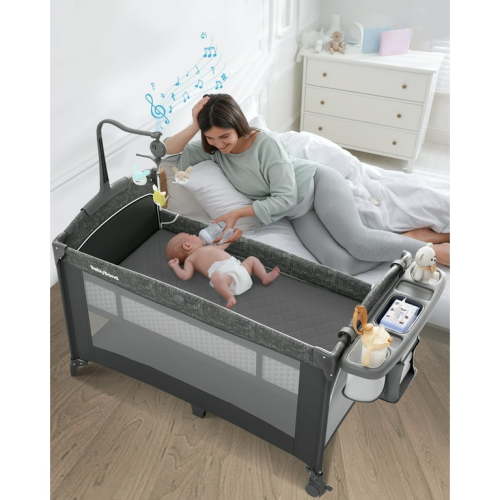 5 in 1 Baby Bassinet Bedside Crib, Easy Folding Portable Playards, Pack and Play with Mattress, Diaper Changer and Music Mobile Pink
