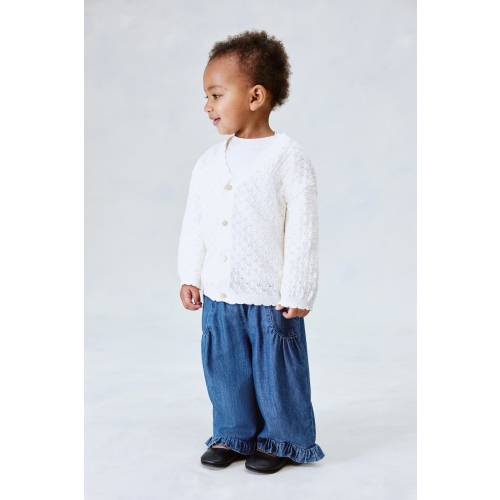 WIDE-CUT RUFFLE-TRIMMED JEANS
