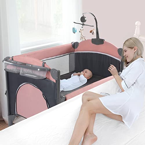 Jaoul 5 in 1 Baby Crib, Bassinet Beside Sleeper, Pack and Play with Bassinet and Changing Table Portable Travel Playpen with Toys & Music Box, Mattress for Girl Boy Infant Newborn Pink