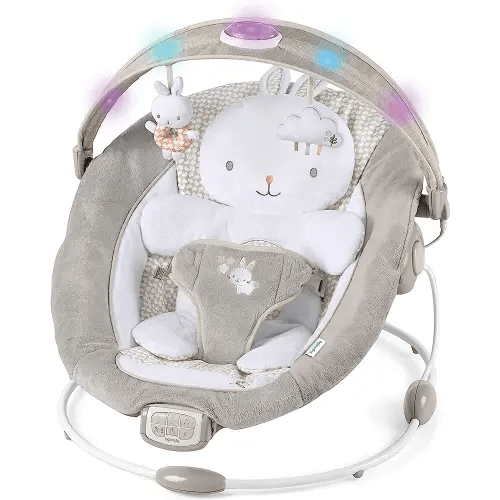 Ingenuity InLighten Baby Bouncer Infant Seat with Light Up -Toy Bar, Vibrations, Tummy Time Pillow & Sounds, 0-6 Months Up to 20 lbs (Twinkle Tails Bunny)