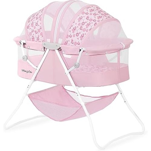 Dream On Me Karley Bassinet in Pink, Lightweight Portable Baby Bassinet, Quick Fold and Easy to Carry, Adjustable Double Canopy, Indoor and Outdoor Bassinet with Large Storage Basket.