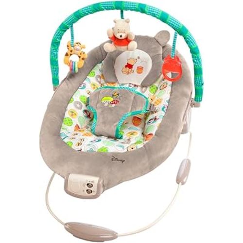 Bright Starts Disney Baby Winnie the Pooh Baby Bouncer Soothing Vibrations Deluxe Infant Seat - Faux Suede, Music, Removable -Toy Bar, 0-6 Months 6-20 lbs (Dots & Hunny Pots)
