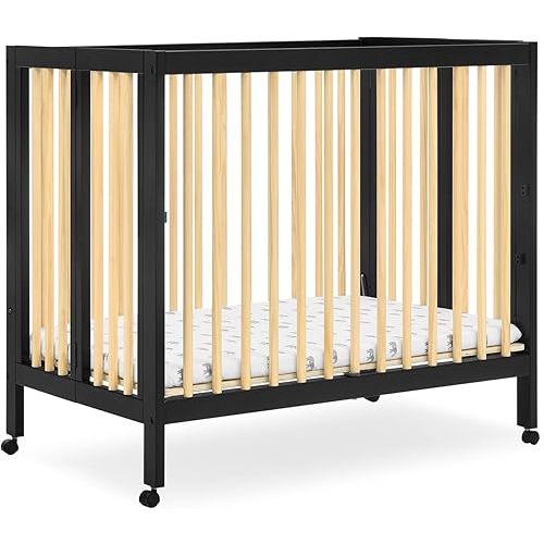 Delta Children Mia Portable Folding Mini Crib with 1.5-Inch Mattress - Greenguard Gold Certified, Ebony Black/Natural