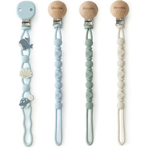 Moonkie Silicone Pacifier Clips for Baby – Durable One-Piece Binky Holder, Mixed Styles Paci Clips, Baby Essentials for Newborn Boys & Girls - 4 Pack (Sea Whispers)
