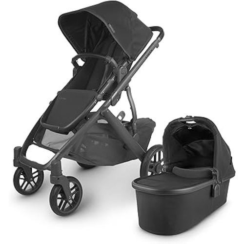 UPPAbaby Vista V2 Stroller / Convertible Single-To-Double System / Bassinet, Toddler Seat, Bug Shield, Rain Shield, and Storage Bag Included / Jake (Charcoal/Carbon Frame/Black Leather)
