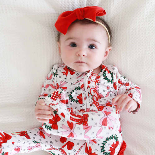 Wrapped In A Bow Ruffle Zipper Footie*